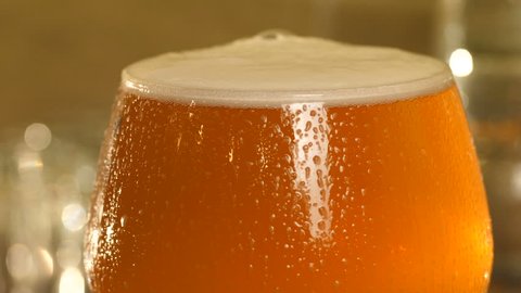 Image result for ice cold beer with perspiration trickling down the glass