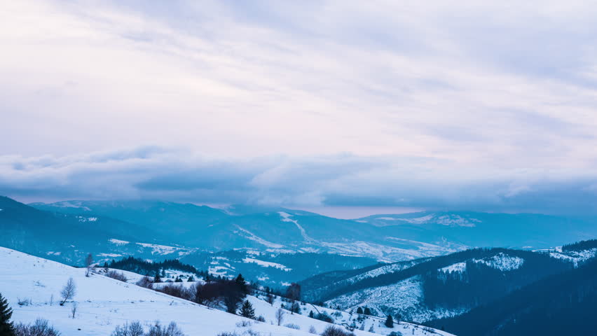 Nature Background. Timelapse Mountains: Fast Clouds Motion At The Blue