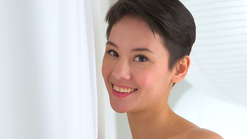 Beauty Closeup Of Beautiful Female Model Applying Stripe Of Liquid Foundation On Fresh Facial