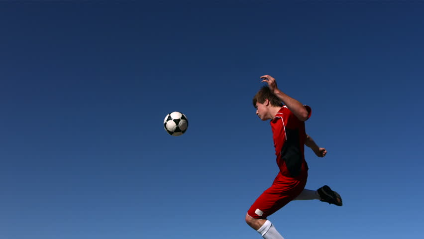 Soccer Player Kicking Ball In Stockvideos Filmmaterial 100
