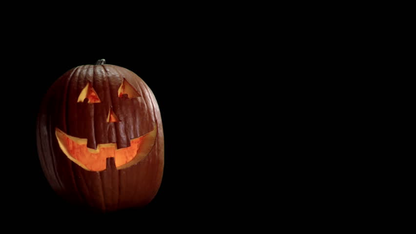 carved halloween pumpkin on a black background with room for images hd stock video - Halloween Background Video carved halloween pumpkin on a black background with room for images hd stock video - Halloween Background Video