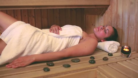 Brunette Wearing Towel Relaxing Sauna Hotel Stock Footage Video (100%  Royalty-free) 4700267 | Shutterstock