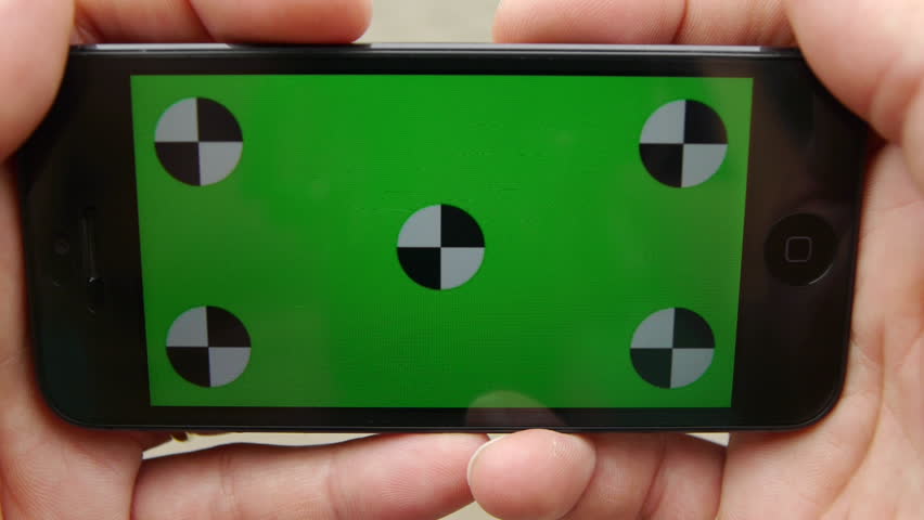 Using A Smart Phone Held Stock Footage 100 Royalty Free Using A Smart Phone Held By Two Hands Green Screen Chroma Key Close Up Tracking Motion Hotizontal Tile Floor Background
