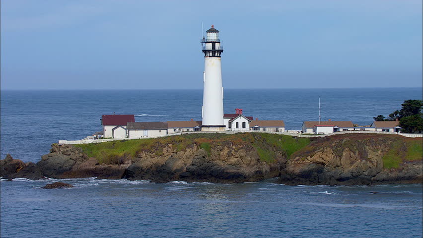 Stock video of lighthouse ocean coast beach. lighthouse located