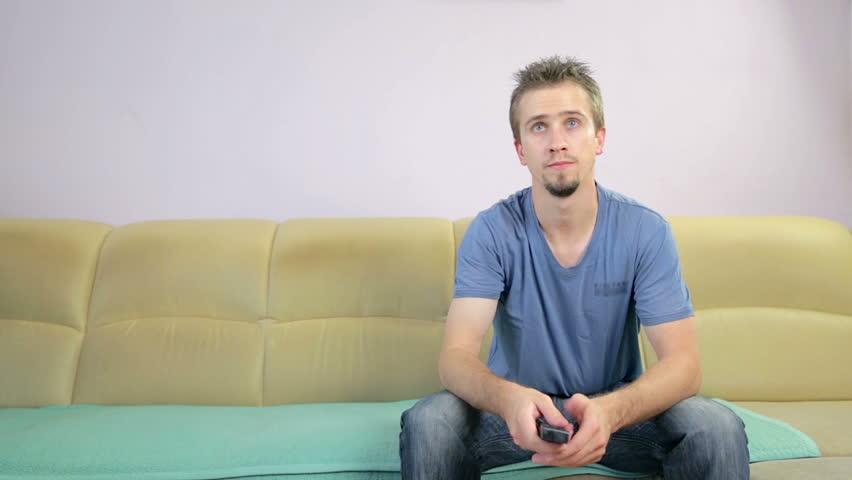 Person Sits On Couch And Stock Footage Video 100 Royalty Free