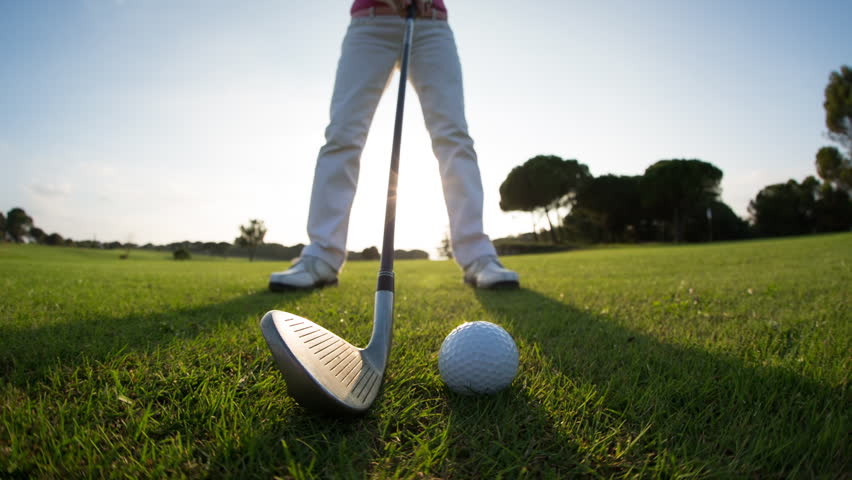 Ролик гольф. Гольф стоковое. Дети играют в гольф. Женщина играет в гольф. Зонт для игры в гольф.